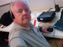 Four County ARES Vice President Tom Hillery KG4EDY logging contacts at the 40m voice station.